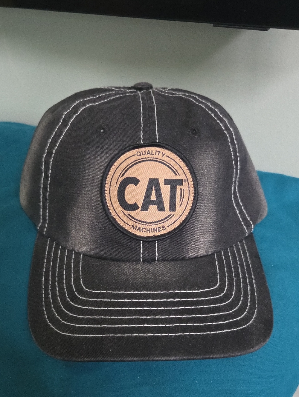 Embroidered Logo Black Cap with Contrast Stitching